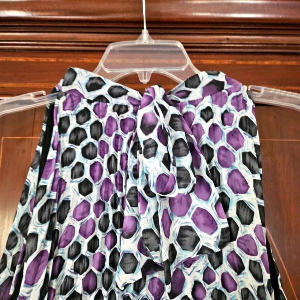 A dress size 8 softly worn.